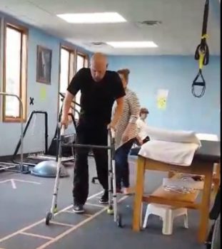 Army Sergeant Aaron Jolly takes steps again after being paralyzed